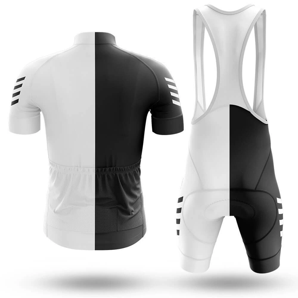 Back view of a minimal split black and white cycling jersey and matching bib shorts on cycling.