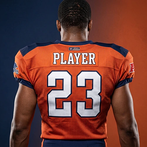 Back view of a custom American football jersey with player name and number 23 in orange and navy colors.
